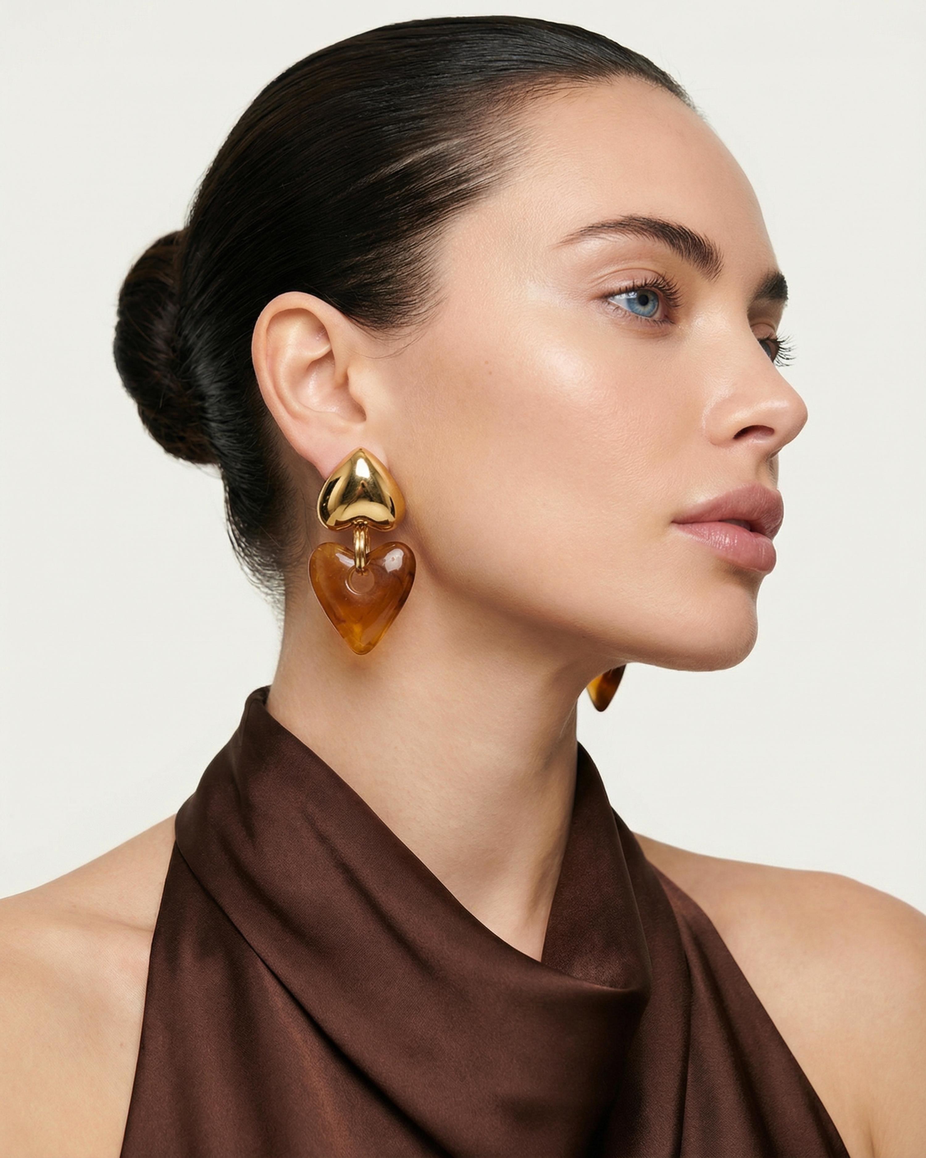 DUAL HEART STATEMENT EARRINGS